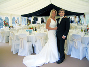 Wedding couple and marquee